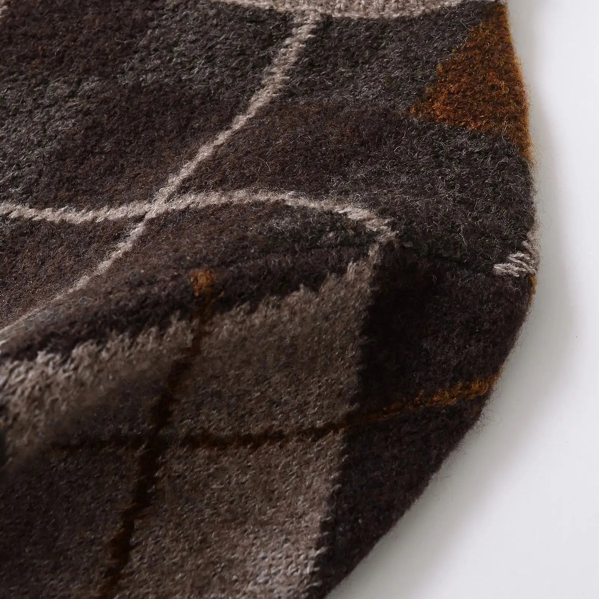 Gilet à motif losanges pour femme avec fermeture boutonnée et bords côtelés