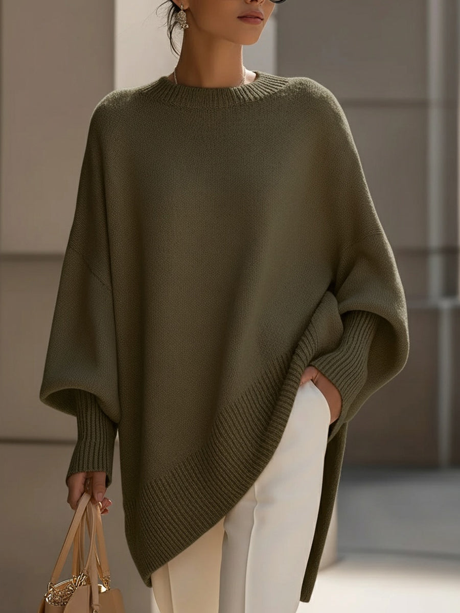Women's asymmetric hem jumper full-length styling view