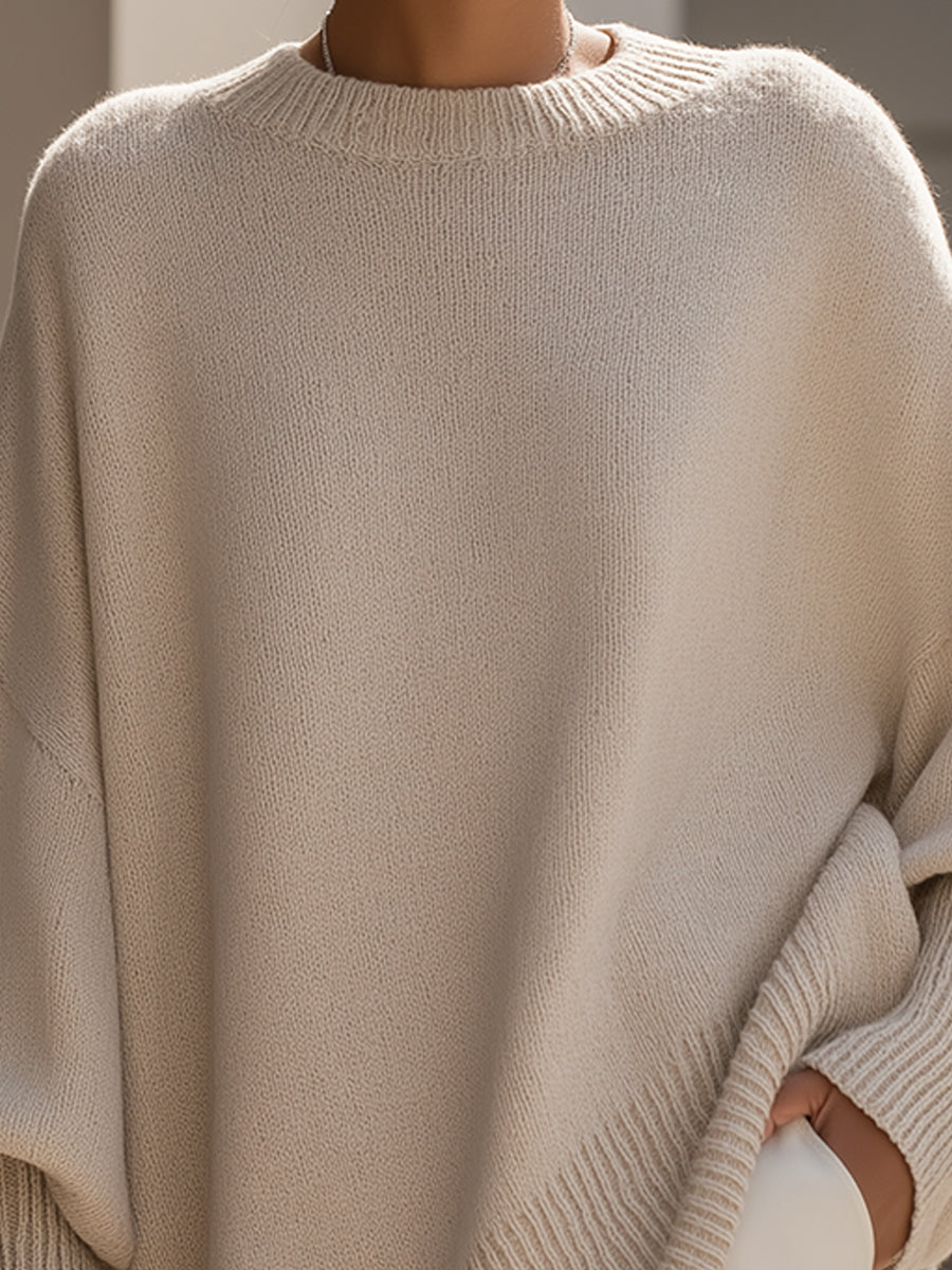 Women's asymmetric hem jumper hemline close-up