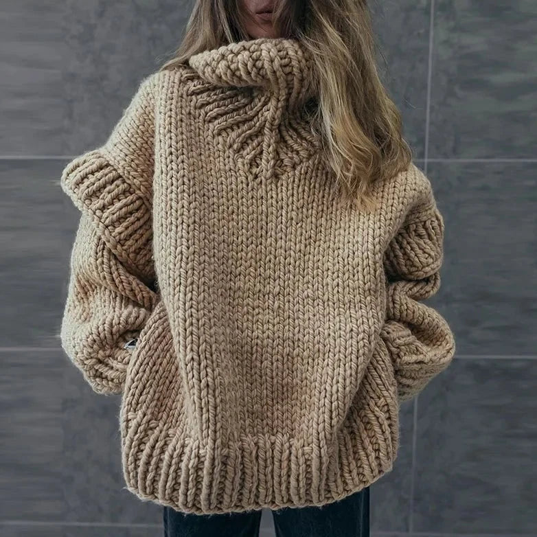 Women's Chunky Turtleneck Knit Jumper – Oversized Fit, Ribbed Hem showing high turtleneck