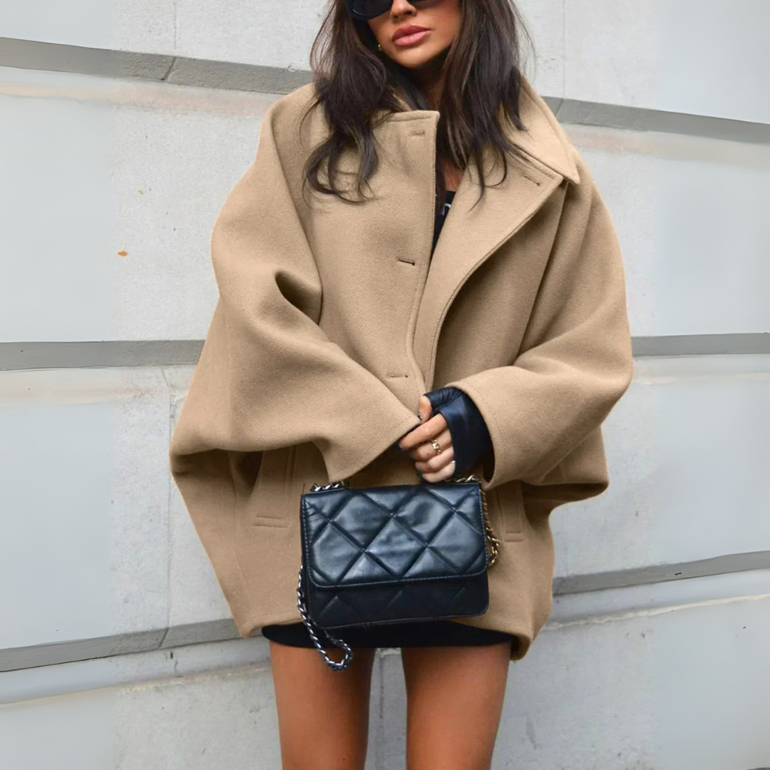 Manteau oversize pour femme avec col à revers cranté et boutonnage dissimulé sur le devant