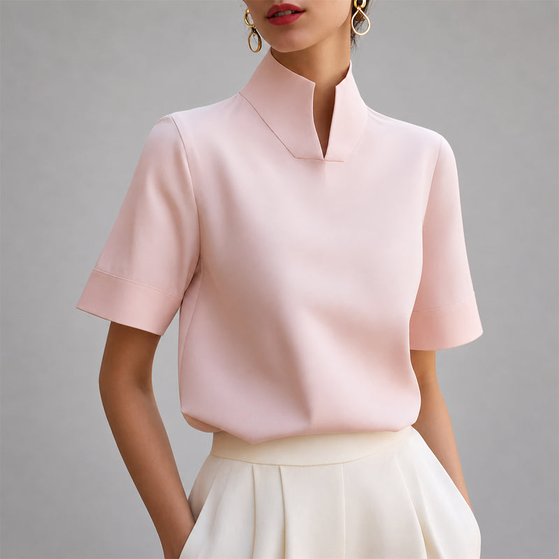 Women's mock neck blouse showing stand collar detail