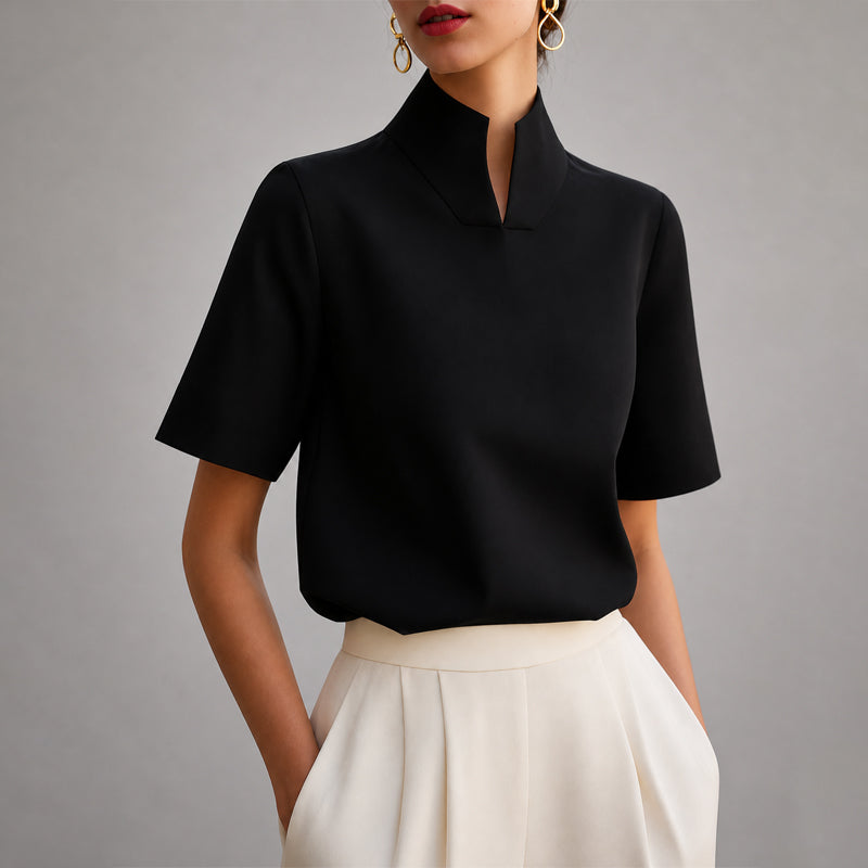 Women's structured short-sleeve blouse close-up of neckline